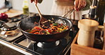 Stove, hands and person with vegetables for cooking, frying and preparation for healthy diet in kitchen. Culinary, female cook and above with food for staring, vegan and nutrition meal with peppers