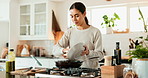 Woman, smartphone and cooking in kitchen for breakfast, recipe and online video with tips or guide. Female person, smell and meal prep in house for brunch, instructions or learning with food podcast