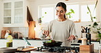 Woman, smartphone and cooking in house for breakfast, recipe and online video with tips or guide. Female person, smell and meal prep in kitchen for brunch, instructions or learning with food podcast