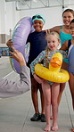 Children, phone screen and happy for photograph by swimming pool, lesson and funny face for memory. Hands, smartphone and profile picture with kids, duck and donut toys to float, safety and diversity