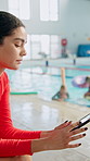 Coach, woman and phone with children at swimming pool for social media scroll or safety risk. Person, water and kids with distracted lifeguard at indoor sports centre with internet, danger or caution