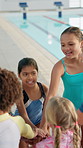 Group, children or hands in huddle for swimming at school for sports fitness, aquatic learning or success. Goal, team or instructor with happy kids for performance target or skill development in pool