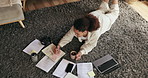 Woman, student and writing with documents on floor for planning, schedule and coffee with research for thesis. Person, girl and notebook with reading, drink and above for education on carpet in home