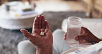 Pills, hands and senior person with water for medication for treatment of parkinsons, tremors or sickness. Healthcare, illness and patient with tablets medicine for healing in retirement home.