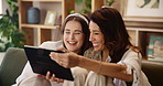 Mother, daughter and talking of photo frame on sofa with laughing, funny memory and nostalgia in house. Family, woman and girl on couch with photograph to remember, history and joke in living room