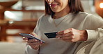 Woman, hands and credit card for online shopping in home, smartphone and website for order checkout. Female person, ecommerce and internet for financial payment, electronic transaction and banking