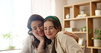 Hug, mature mother and daughter at laptop with bonding, good news email and happy in living room. Relax, mom and girl in embrace with smile, love and support for online course registration in home