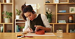 Woman, clay and bowl for pottery, workshop and creative art in ceramic store with tools, shape and mold. Artisan, sculpture and handcraft in studio for porcelain, texture and design with fun hobby