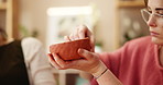 Hands, woman and mold bowl in pottery class for art, handmade craft and creative talent. Clay, shape ceramic and friends in workshop for learning hobby, design process and texture closeup in studio