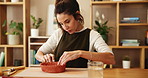 Woman, clay and design for pottery, workshop and creative art in ceramic store with tools, shape and mold. Artisan, sculpture and handcraft in studio for porcelain, texture and bowl with fun hobby