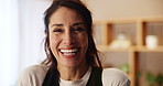 Mature woman, face and laughing in home, happiness and listening to funny joke in living room. Female person, portrait and confident for comedy in retirement, morning humor and weekend to relax