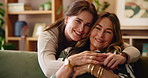 Hug, face and woman with mature mom for bonding, relationship or relax together in home. Family, happy and portrait of mother and daughter on couch embrace for love, affection or smile in living room