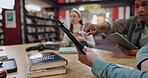 People, studying and hands with tablet in library for group project, research and information. University, student and planning with technology at campus for higher education, assignment or knowledge