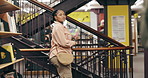 Walking, textbooks and woman in library at university for studying with admission test for scholarship. Education, knowledge and female student with college material for learning with exam or project