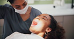 Dental, light or girl with dentist for tooth extraction, cavity and gum disease in consultation for help. Clinic, removal tools or client with woman for teeth whitening, oral care or mouth treatment