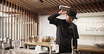 Man, shaker and bartender at restaurant with cocktail for service, hospitality or catering. Strainer, waiter and male mixologist prepare alcohol drink for order at social lounge or pub for happy hour