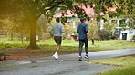 Men, running and park with marathon training, sport and athlete on job for fitness outdoor. Path, cardio and friends back with race exercise and workout for health and wellness in winter on trail