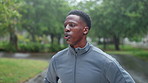 Breathe, running and black man in park tired for marathon training, exercise and workout. Sports, athlete and person for rest, recovery and fatigue for performance, endurance and fitness for health