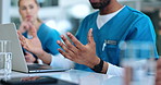 Doctor, team and hands with laptop for meeting, discussion or presentation on medical procedure at hospital. Closeup, employees or nurses with technology or group for brainstorming ideas at workplace