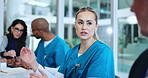 Woman, doctors and meeting in office at hospital with laptop, discussion and report for healthcare service. Clinic director, staff and team in boardroom with computer, feedback or performance review