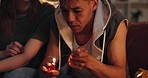 Man, heroine and addict with teaspoon or lighter for substance abuse, pain or overdose at home. Young, male person or addiction with burner for overdose, craving or dopamine and serotonin at house