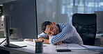 Computer, desk and sleeping with business man in office for burnout, exhaustion or fatigue at night. Deadline, overtime and rest with tired employee person in workplace for break, dreaming or nap