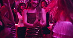 Friends, women and smile with dancing at nightclub for disco event, laughing and fun together. Group, people and circle with energy, bonding and celebration with entertainment and social gathering