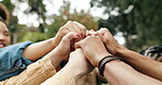 Support, holding hands and teamwork in synergy or huddle for university education or study. Group of people, connection and collaboration with students for community, motivation and project in Canada