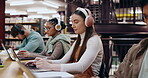 University, student and headphones with laptop in library for writing assignment essay, study music or exam research. Girl, group and person with notebook for online course, radio audio and education