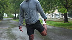 Stretching legs, fitness and black man in park for exercise, marathon training and running. Sports, athlete and person outdoors for warm up, workout and start for wellness, health and performance