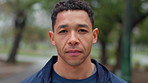 Fitness, serious and face of man in park for exercise, marathon training and workout for health. Sports, athlete and portrait of person outdoors for challenge, motivation and determined for wellness