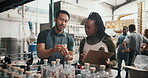 Bottle, factory and distillery with team of people for distribution, manufacturing and alcohol production. Fermentation technician, quality control and checklist with person for clipboard inspection