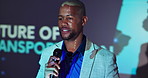 Microphone, conference and black man speaker with presentation on podium for vehicle innovation. Speech, tradeshow and African male logistics engineer talking at seminar for future of transportation.