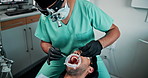 Dental, cleaning and man with dentist in office for oral hygiene, healthcare and plaque removal. Teeth, service and work with equipment in consultation for appointment, procedure or cavity prevention