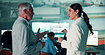 Security, man and woman in control room planning defence strategy for satellite video on computer screen. Government, digital surveillance and high tech team with cyber intelligence in command center