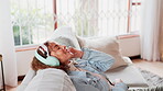 Smile, peace and woman with headphones on sofa for streaming, entertainment and listening to song. Home, person and eyes closed with technology in living room for sound, audio and music on playlist