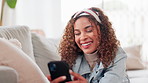 House, funny and woman with smartphone, typing and internet for social media, online humor and relax. Happy person, apartment and girl with cellphone, joke or digital app for email, contact and laugh