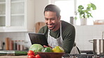 Man, home and tablet for food blog in kitchen, nutrition and vegetables for vegan diet. Male person, stove heat and internet for online recipe instructions, streaming tutorial and lunch process