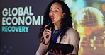 Speech, tablet and woman with mic, talking and event for global economic recovery, speaker and discussion. Public speaking, opportunity and ideas for trade, investment and person in conference
