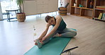 Exercise, stretching and tablet with yoga woman in home living room for holistic or wellness routine. Awareness, balance and pilates with person in apartment for fitness, flexibility or mindfulness