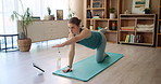 Balance, stretching or yoga and woman with tablet in living room of home for holistic or wellness routine. Awareness, fitness and pilates with yogi person in apartment for exercise or online class