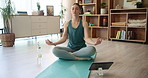 Meditation, tablet and yoga with woman in living room of home for holistic or wellness routine. Awareness, inner peace and online class with yogi person on apartment floor for exercise or pilates