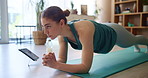 Plank, tablet and time with woman on mat in living room of home for exercise or fitness. Training, watch and workout with athlete person in apartment for health, online class or performance routine
