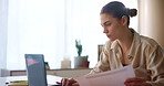 Laptop, reading and woman in home office with document for remote work, email and editing article. Computer, creative freelancer and paper for review, business and publisher check story for copyright