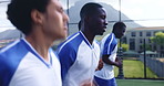 Sports team, running and warm up as soccer player or athlete for practice or training in field. Group of people, outdoor and challenge for match or football game with workout, fitness and exercise