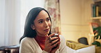 Coffee, relax and thinking with woman on sofa of lounge for happiness, aroma and zen. Wellness, calm and morning with person drinking tea in living room of home for self care, herbal remedy or health