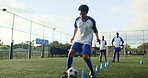 Athlete, running and ball with cone for soccer of fitness practice, warm up and exercise performance. Man, beacon and sports challenge for football balance, agile coaching and game training on field