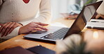 Hands, woman and typing with laptop at house for social media blog, copywriting and website research. Person, freelancer and scroll for online story, email agency and reporter information of article