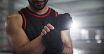 Boxer, man and hands with pain in gym of fighting, wrist injury or training accident with fracture. Boxing workout, professional and massage muscle with ache, sprain or sore with competition recovery
