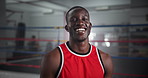 Happy, sports and face of black man boxer in gym for competition practice, match or workout for conditioning. Smile, confident and portrait of fight champion from Nigeria in ring for fitness training